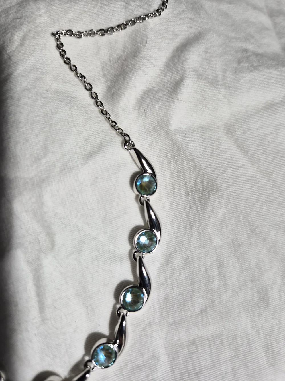 Touchstone Crystal Silver Necklace with Teal Gem Accents